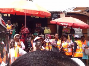 Members educating masses on glaucoma at the market square