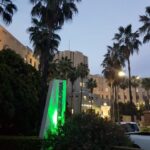 'Light-up in green. Facade of the Ophthalmology Department, University Hospital and Faculty of Medicine, UANL